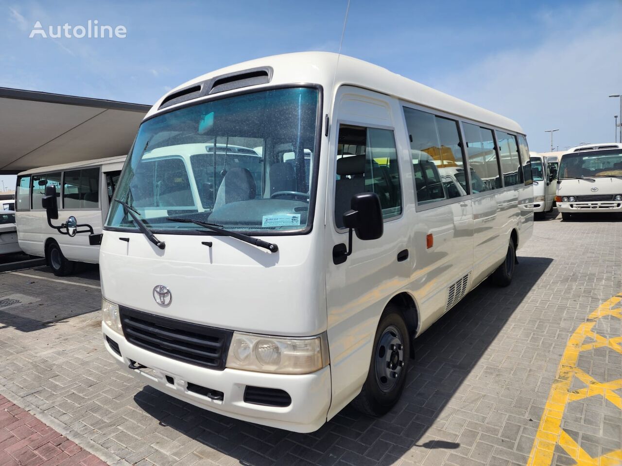 الباص السياحي Toyota Coaster High Roof Coach bus (LHD)
